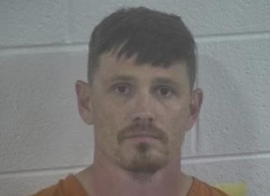 Murray man under supervision caught with a gun