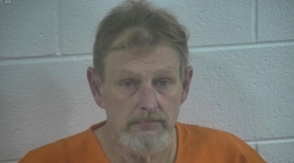 Murray man charged with discharging firearm in home