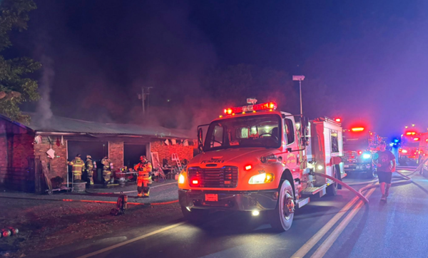 Structure fire in Stella injures shop owner