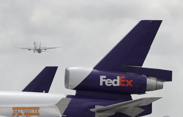 Fed Ex to raise rates, close some offices next year