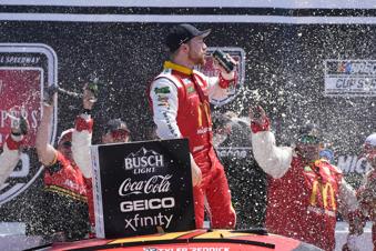 Tyler Reddick wins rain-delayed NASCAR Cup race at Michigan, his 2nd victory of 2024