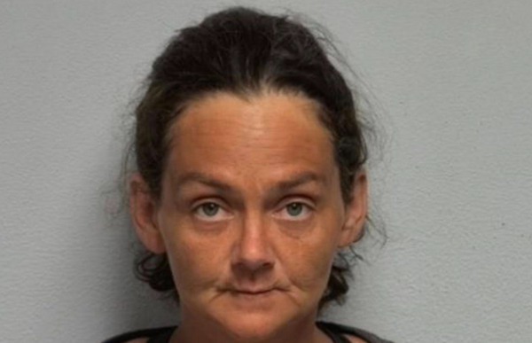 Grand Rivers woman charged after 9 dead dogs found on property