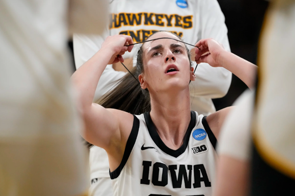 Caitlin Clark hits 27 in Iowa's first-round win over Holy Cross 91-65