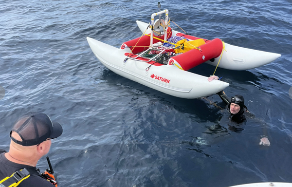 Swim across Lake Michigan abandoned after 60 miles; swimmer dropped GPS batteries in lake