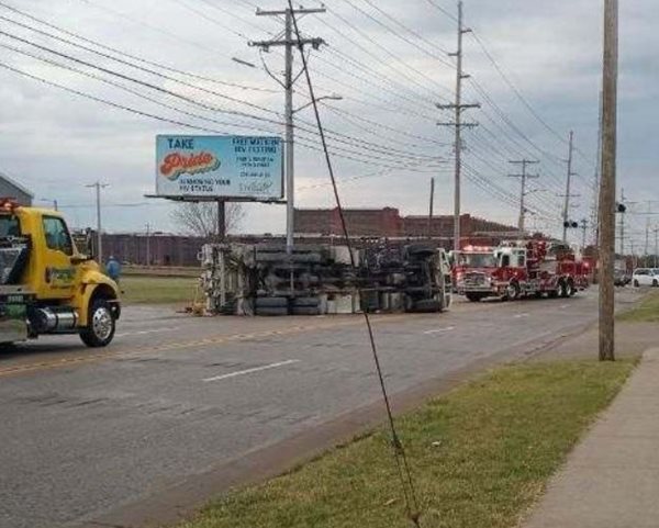 Kentucky Avenue blocked by overturned utility truck