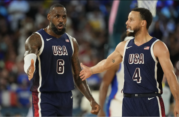 USA wins gold in womens soccer, mens basketball; 3 more in track