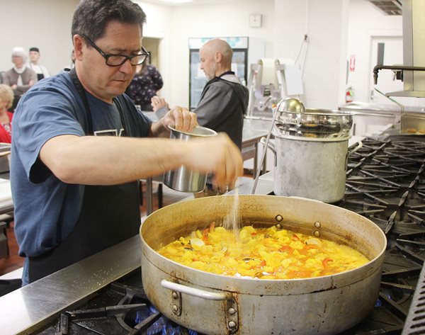 UNESCO instructor makes Spanish dish at WKCTC