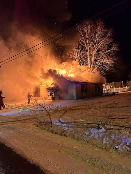 Firemen battle house fire in Benton Friday night
